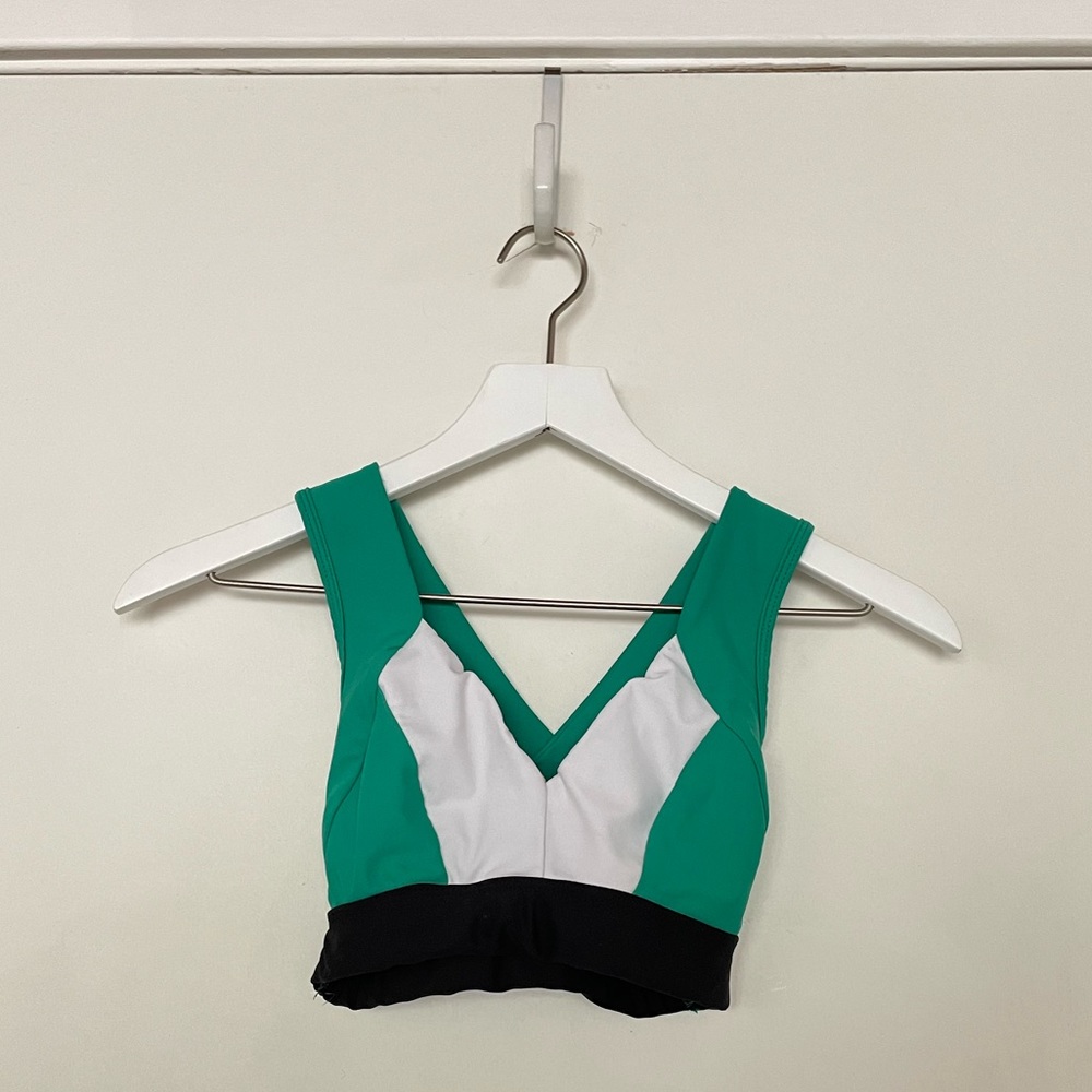 five dancewear black green and white sports bra with thick straps and cross back